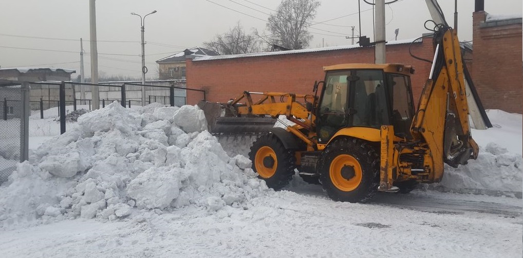 Экскаватор погрузчик для уборки снега и погрузки в самосвалы для вывоза в Курской области